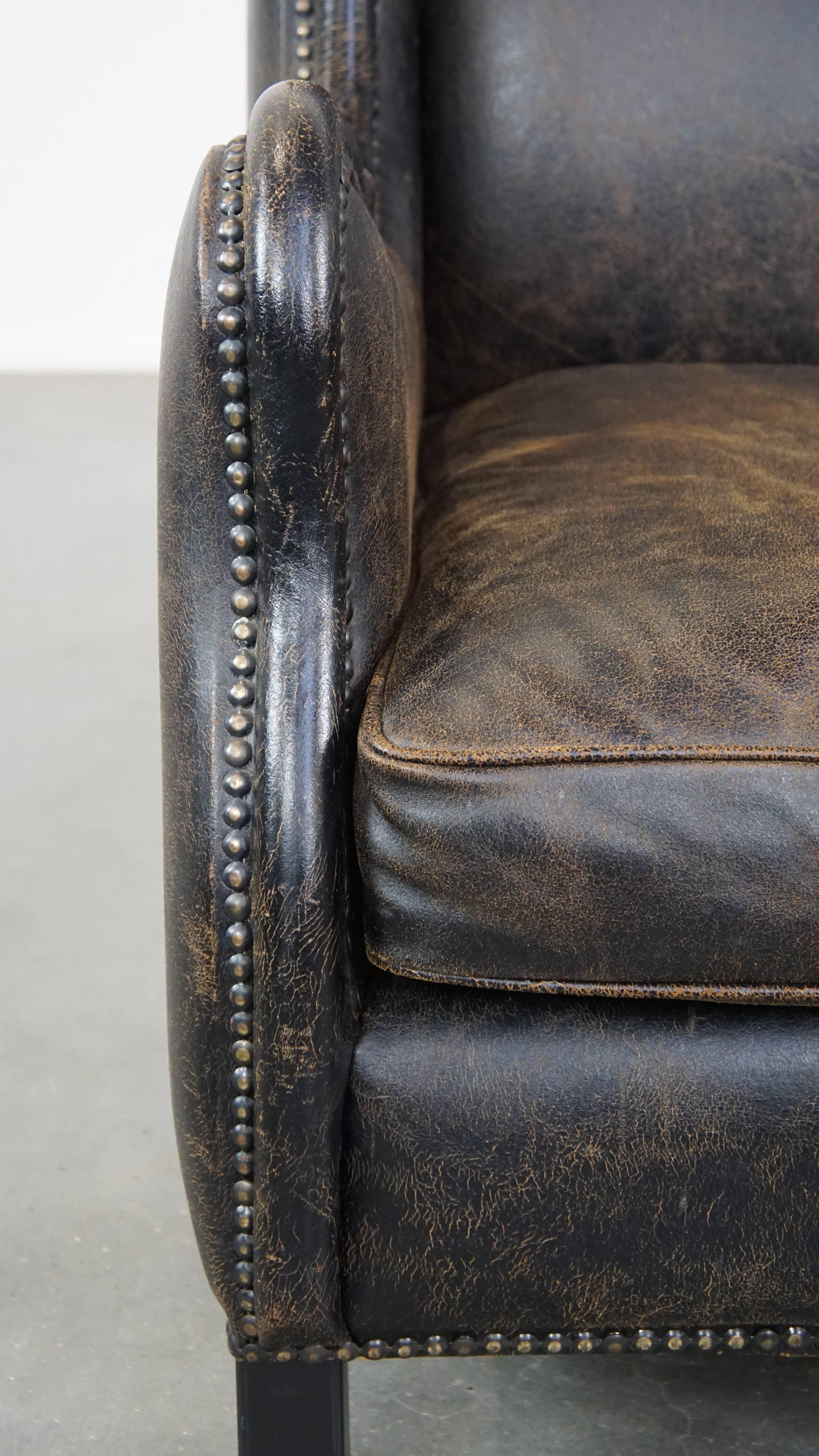Black cow leather armchair finished with decorative nails, industrial style For Sale 3
