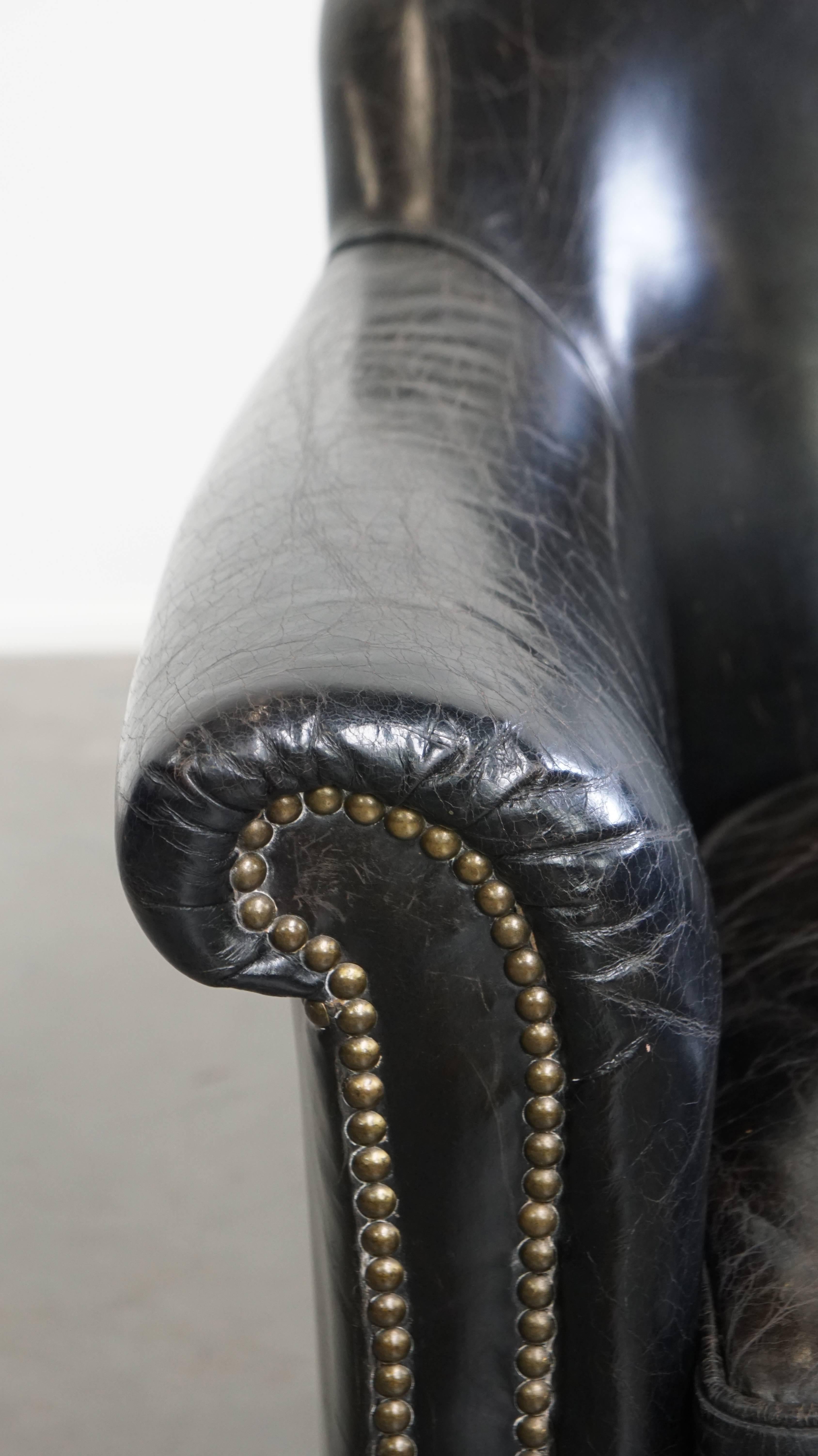 Black cowhide leather armchair en venta 3
