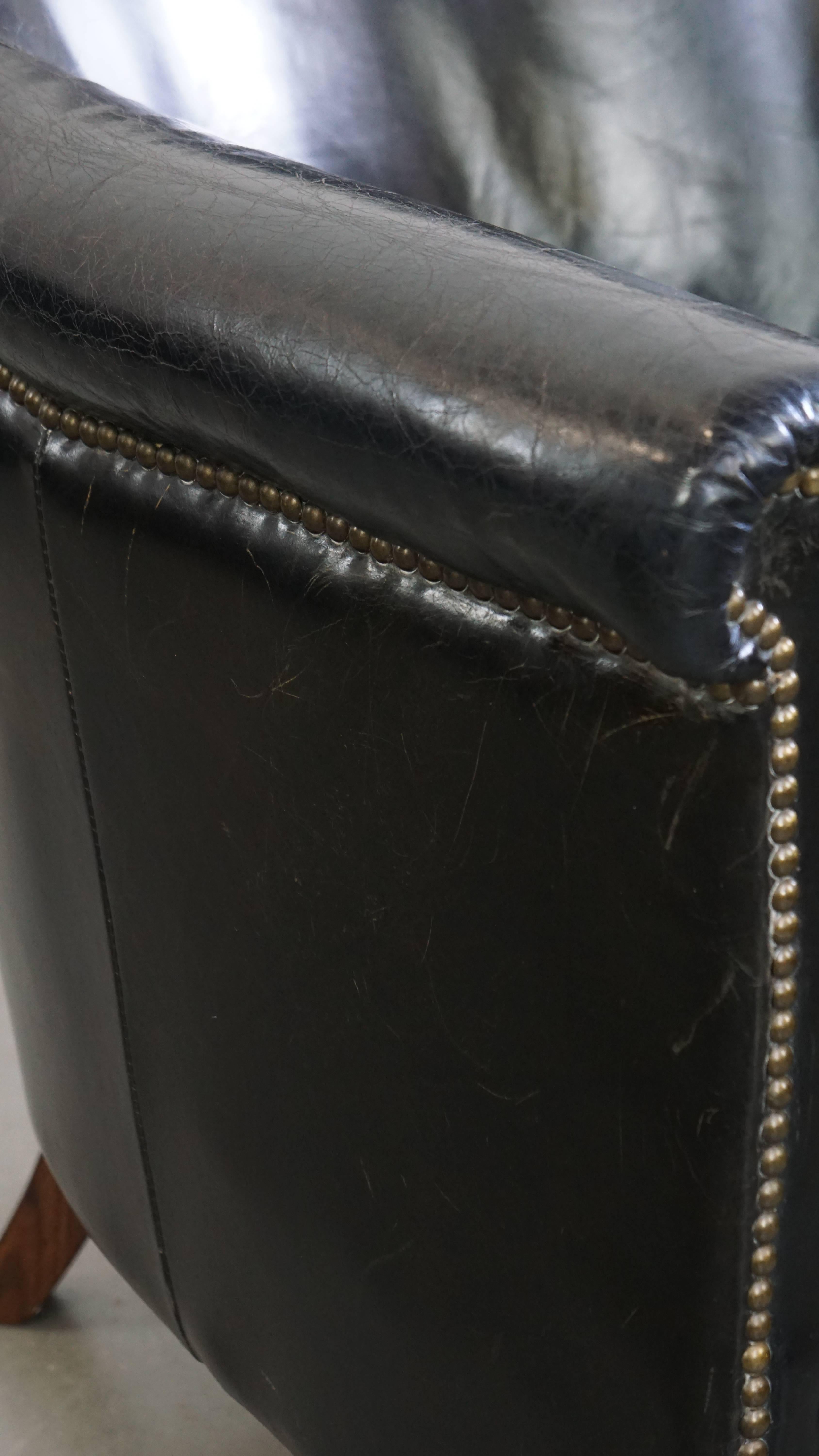 Black cowhide leather armchair en venta 4