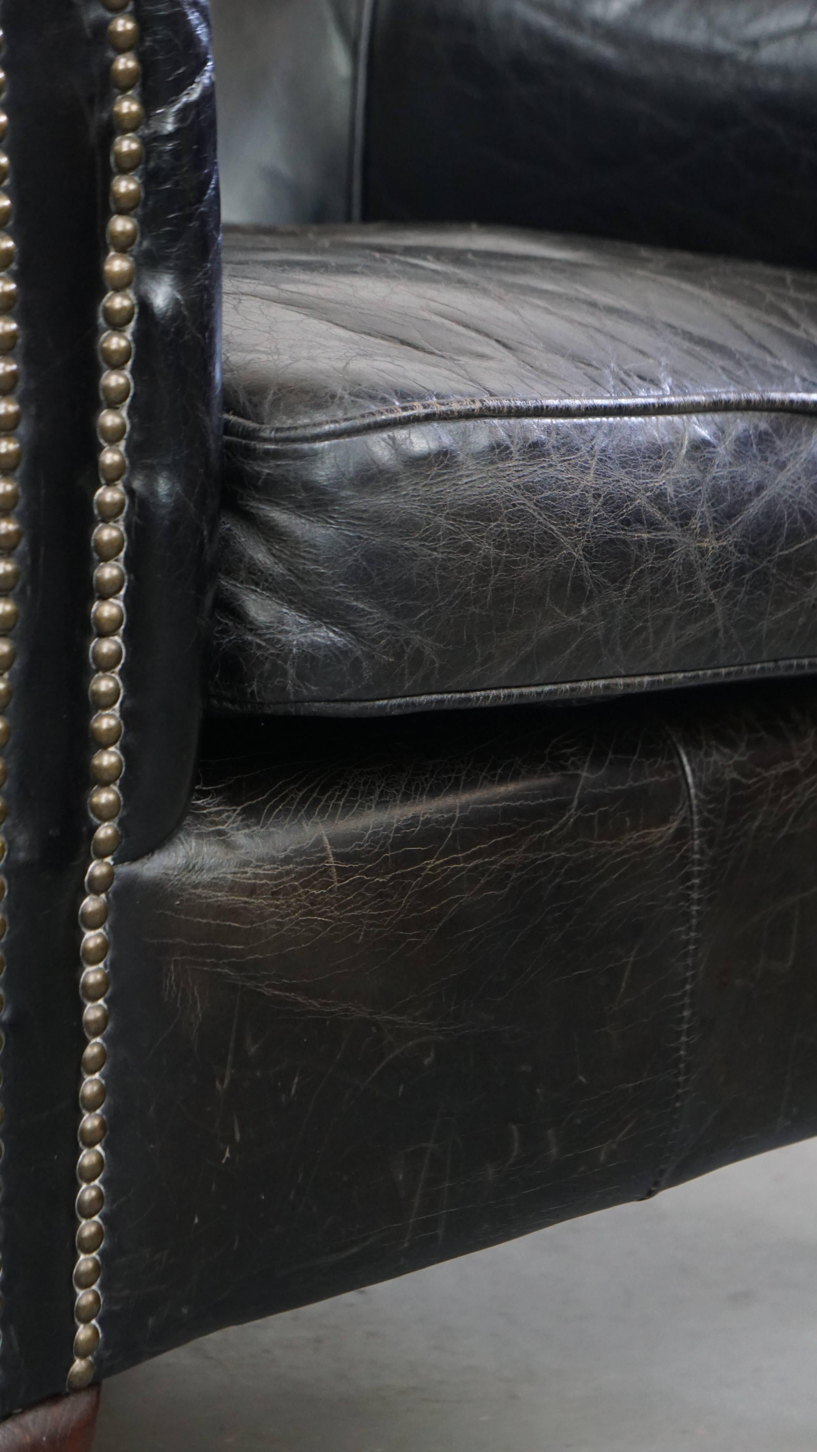 Black cowhide leather armchair en venta 5