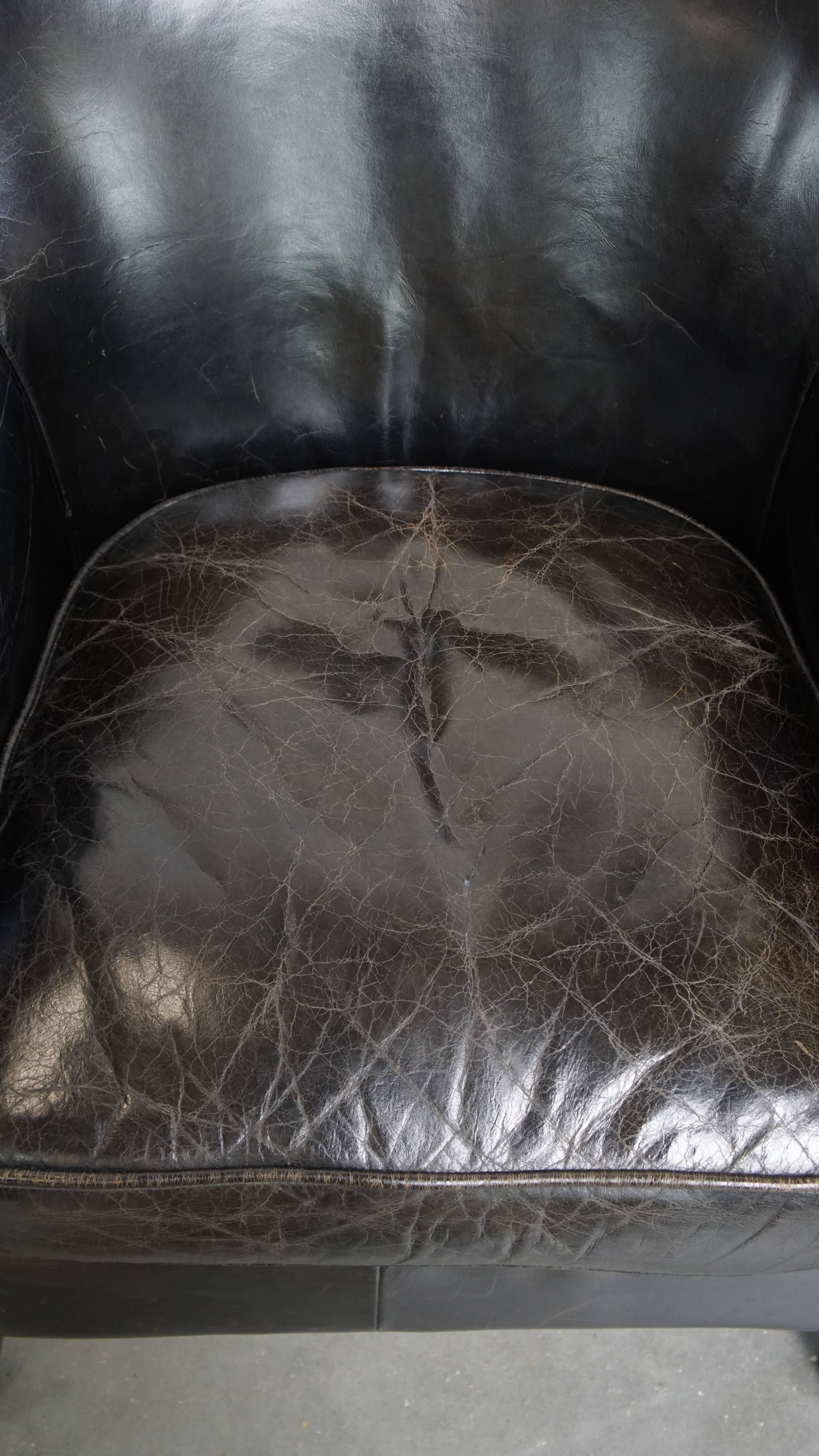 Black cowhide leather armchair Siglo XXI y contemporáneo en venta