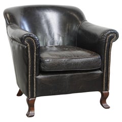 Black cowhide leather armchair