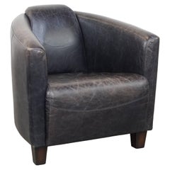Black Cowhide Leather Aviator Armchair with a Sleek Design and Stylish Shape
