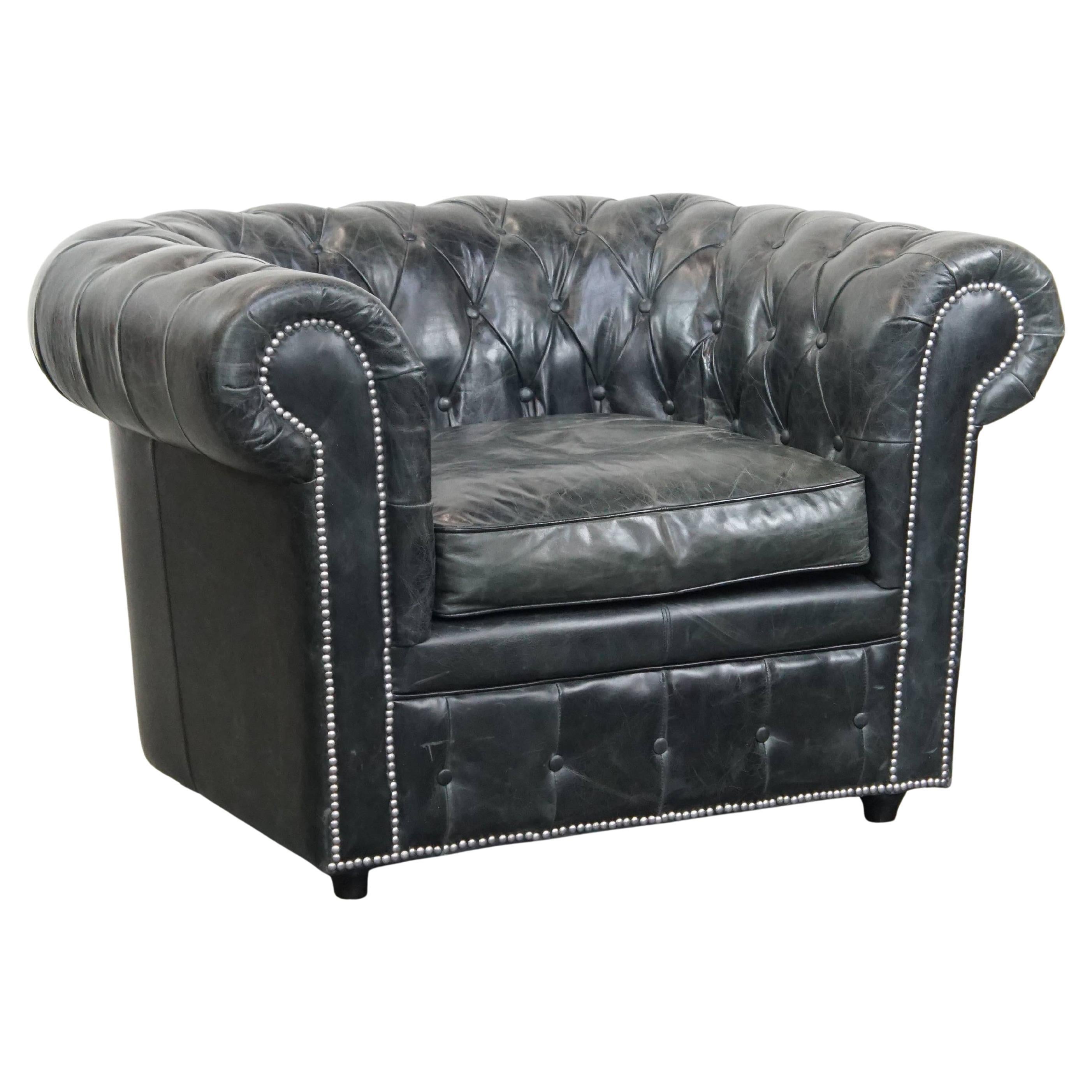 Black cowhide leather chesterfield armchair
