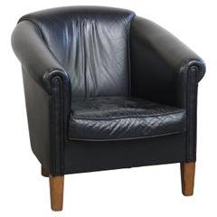 Fauteuil club à l'anglaise en cuir de vachette noir au design Timeless