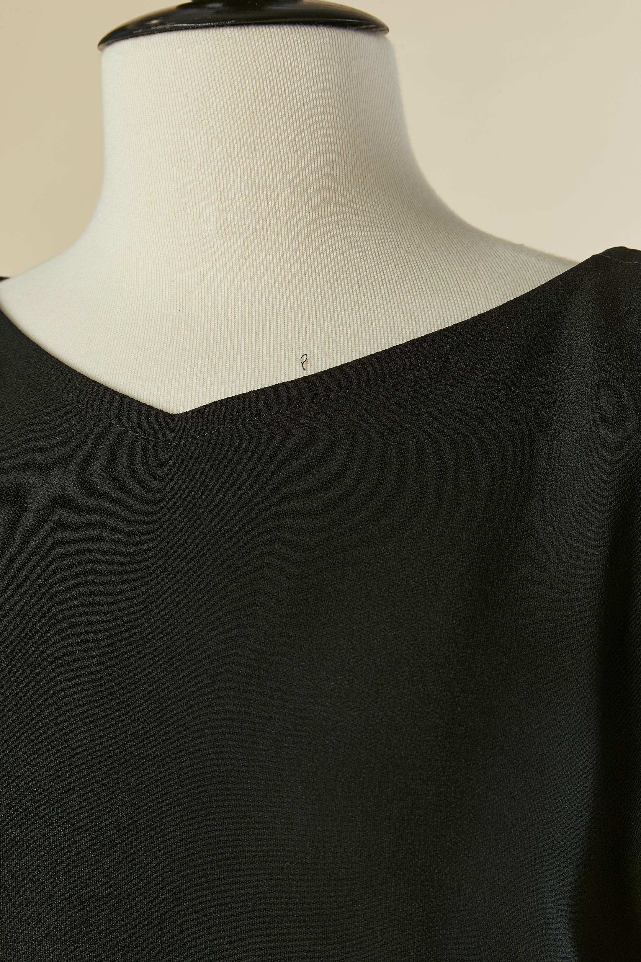 Black crêpe cocktail dress with gold metal button SAINT LAURENT RIVE GAUCHE In Excellent Condition For Sale In Saint-Ouen-Sur-Seine, FR