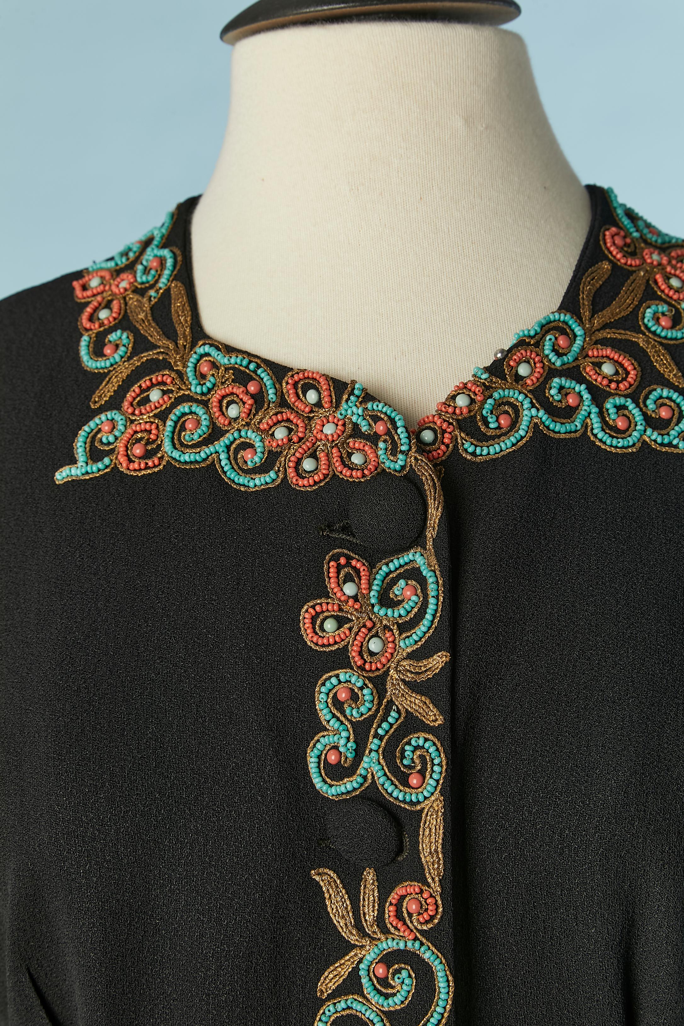 Black crêpe jacket with beaded work on the edge. Button covered with crêpe. 
SIZE S 