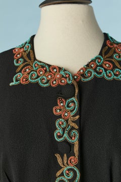 Black crêpe jacket with beaded work on the edge Circa 1940's
