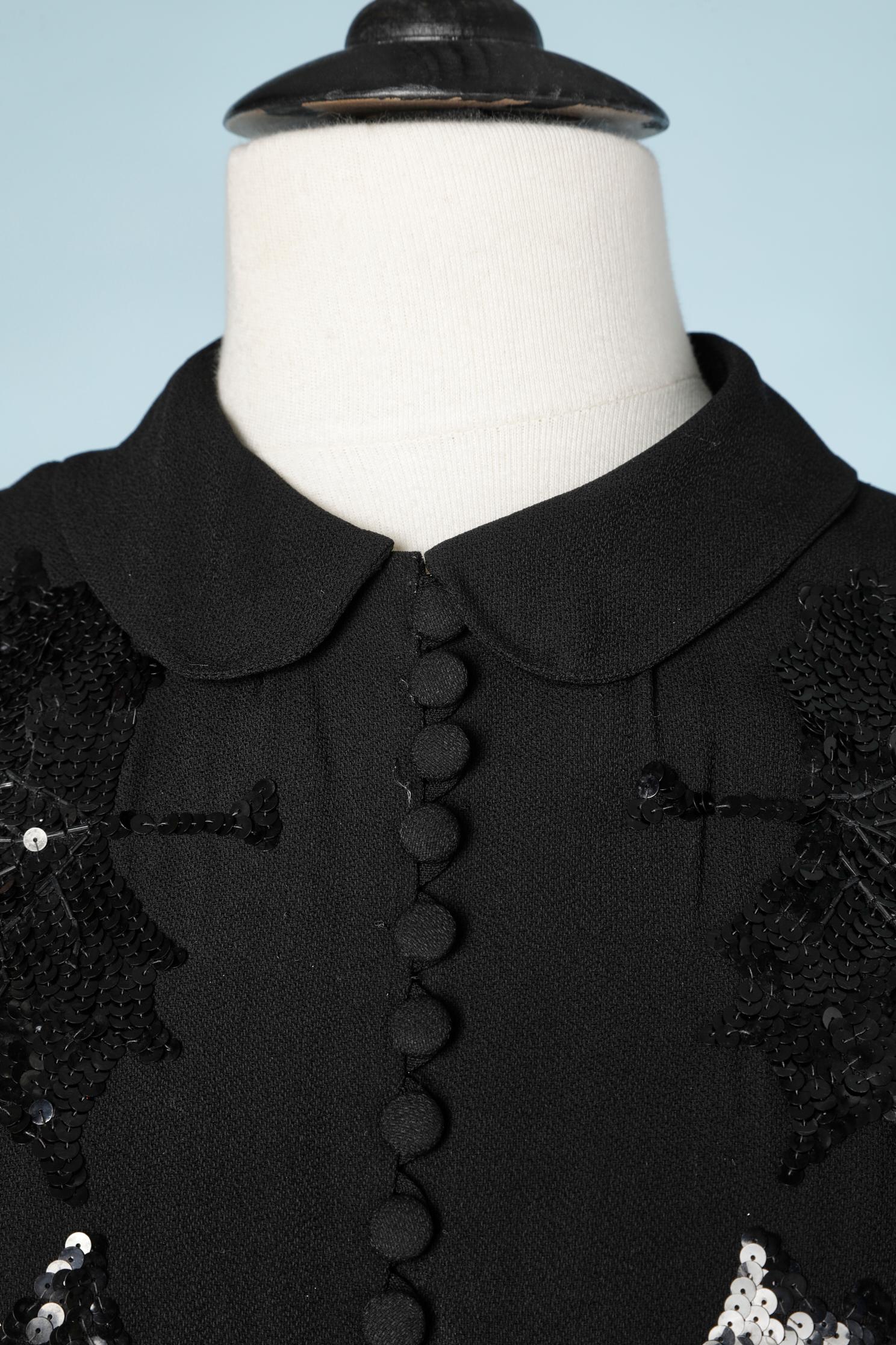 Black crêpe jacket with tree leaves embroideries. Buttons are covered with crêpe. Shoulder pads. Crêpe lining and taffetas lining inside sleeves; Buttons on the cuffs as well. 
SIZE M 