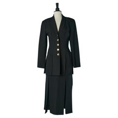 Black crêpe skirt suit with split on jacket and skirt CHANTAL THOMASS (Suite) Black crêpe skirt suit with split on jacket and skirt CHANTAL THOMASS (Suite)