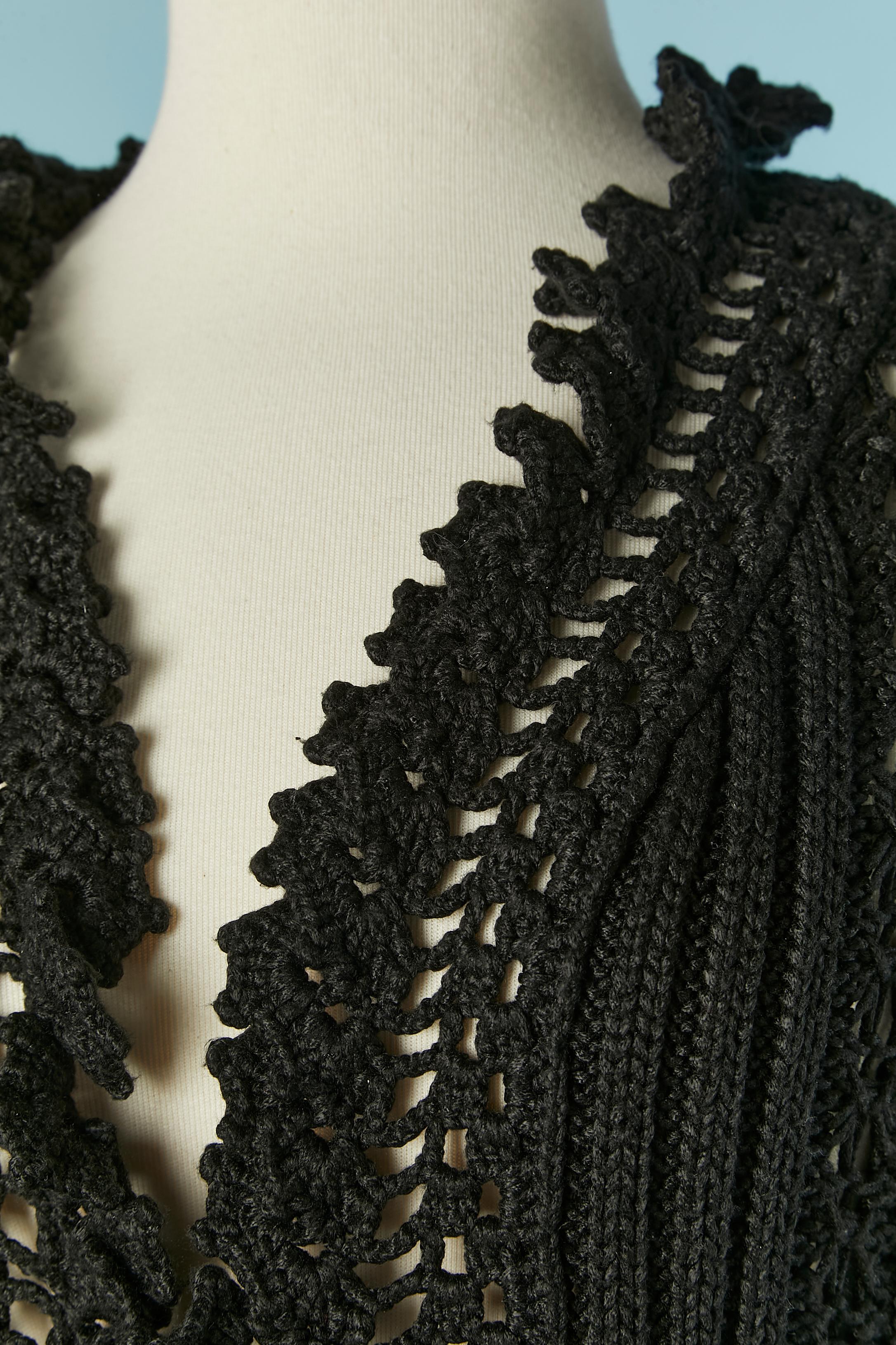 Black crochet cardigan tied on the middle front. Knit composition: 90% rayon 10% polyester. 
SIZE on tag 50 / L 
