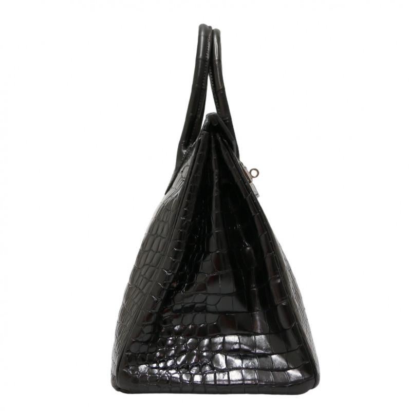 Rare HERMES Birkin 35 bag porosus crocodile with silver hardware, delivered in its original HERMES dustbag

Condition: very good
Made in France
Model: Birkin 35
Material : crocodile porosus leather
Interior : smooth nior leather
Color :