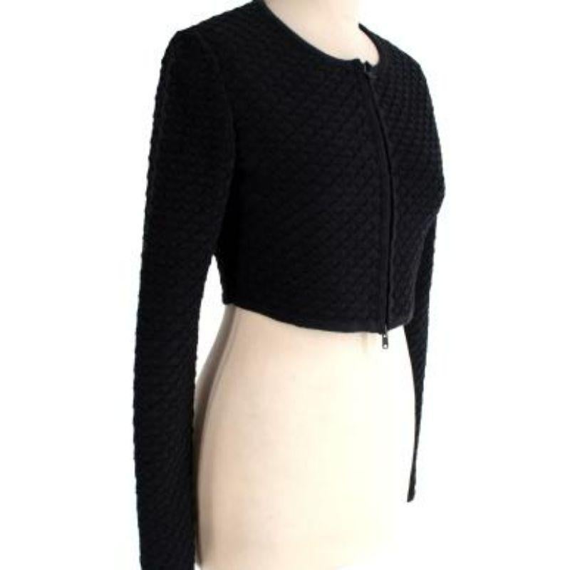 Alaia Black Cropped Jacket
 
 
 
 - Knitted Cropped Cut
 
 - Long Sleeves
 
 - Zip Closure
 
 
 
 Condition 9.5/10. Please use zoom
 
 
 
 PLEASE NOTE, THESE ITEMS ARE PRE-OWNED AND MAY SHOW SIGNS OF BEING STORED EVEN WHEN UNWORN AND UNUSED. THIS IS