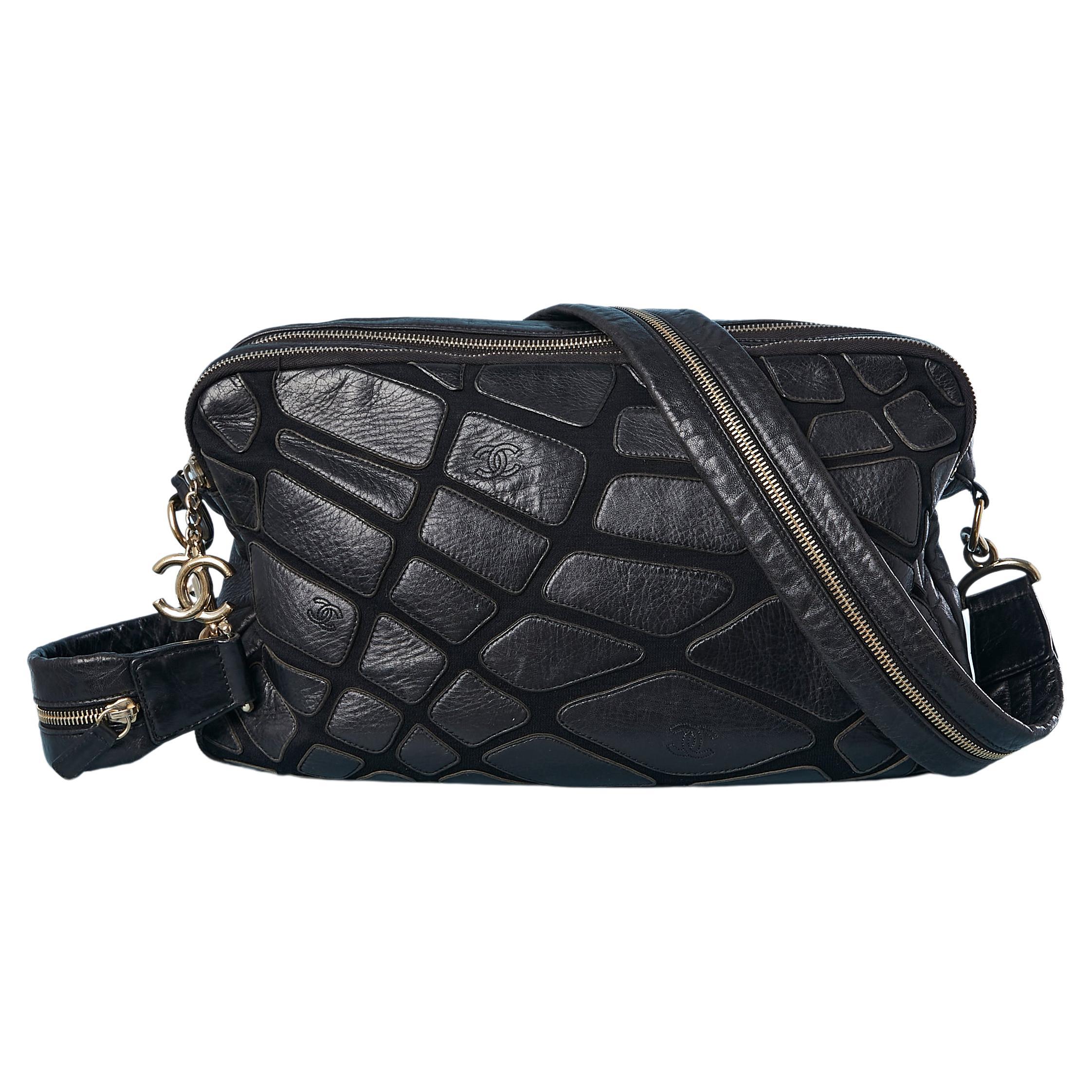 Black cross-body bag with black leather patchwork appliqué Chanel  For Sale