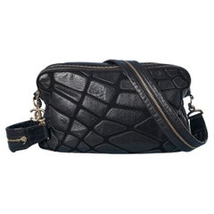 Black cross-body bag with black leather patchwork appliqué Chanel 