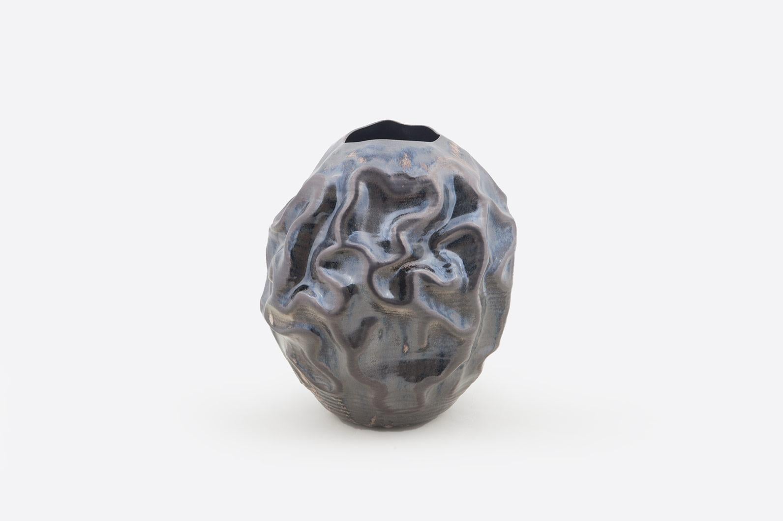 black vessel vase