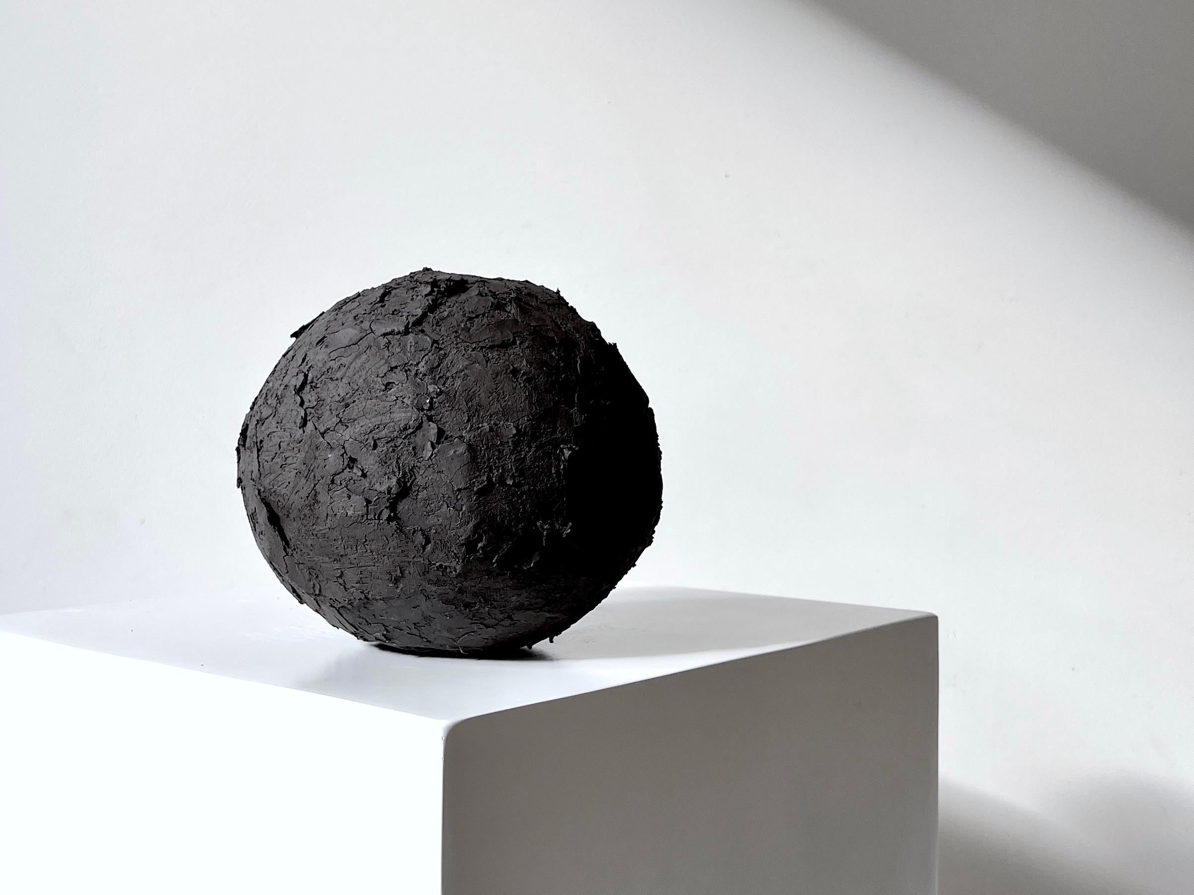 Dutch Black Crust Sphere II by Laura Pasquino
