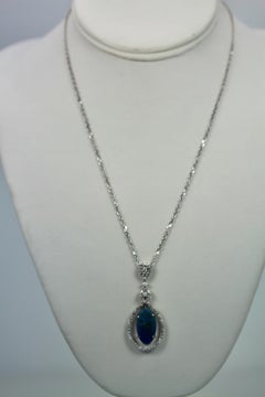 Black Crystal Opal 5.23 Carat Pendant with Diamond Surround