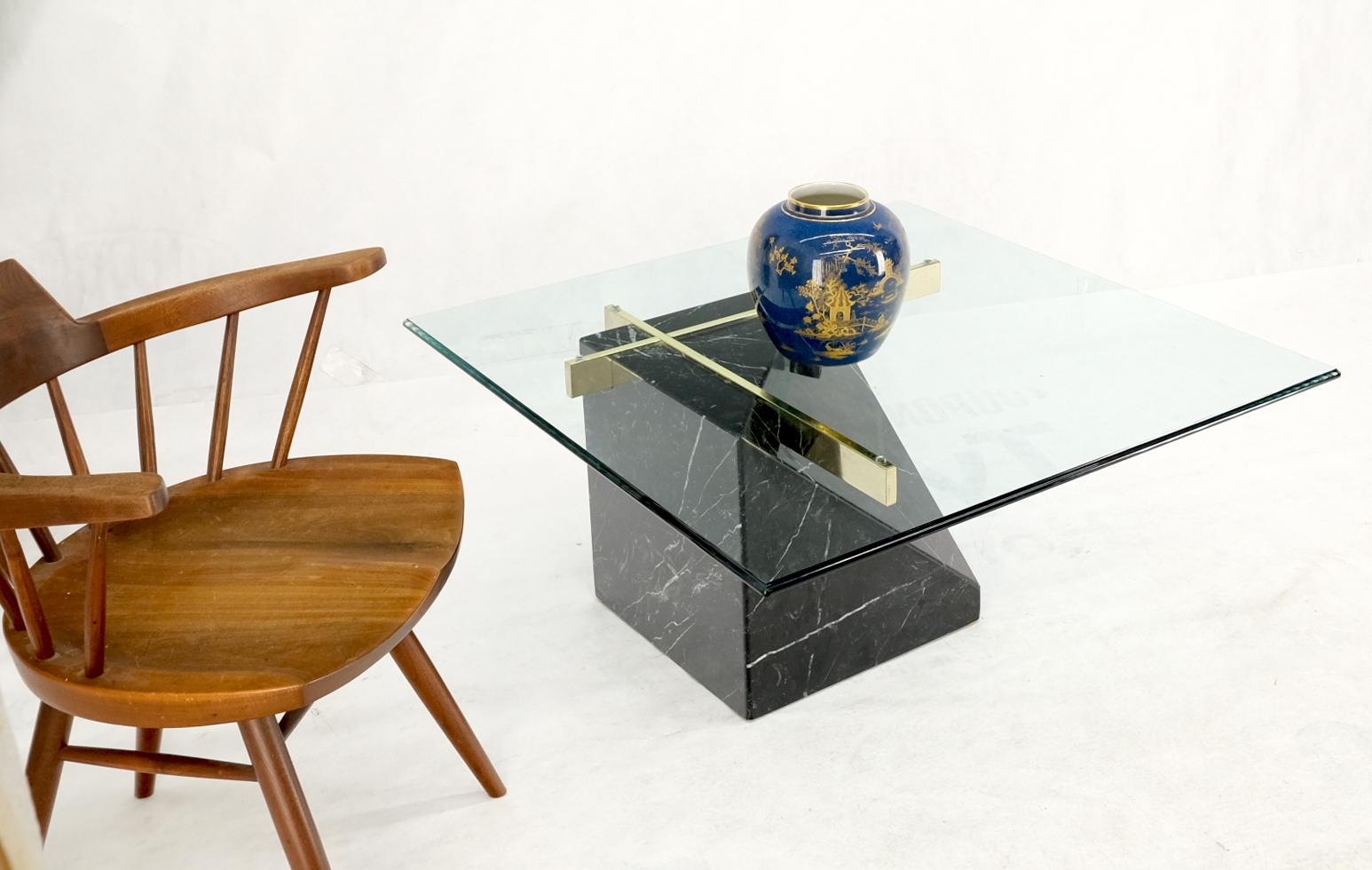 Black cube shape marble base brass stretchers square glass top coffee table.
Cantilever design base Italian coffee table.