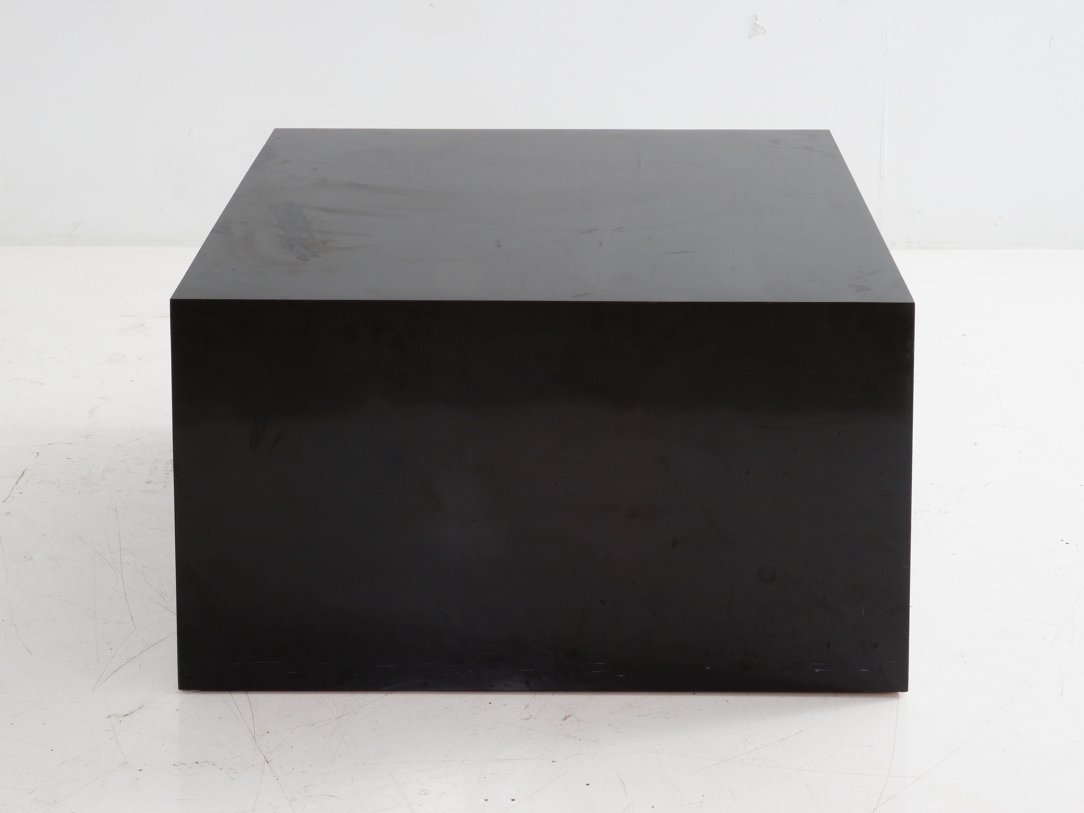 Step into the '80s with this sleek black laminate cube table – your coffee table, your style statement, your postmodern delight. Your living room upgrade has arrived.

- 18.5