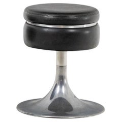 Black cylindrical low stool, steel base. 1970s