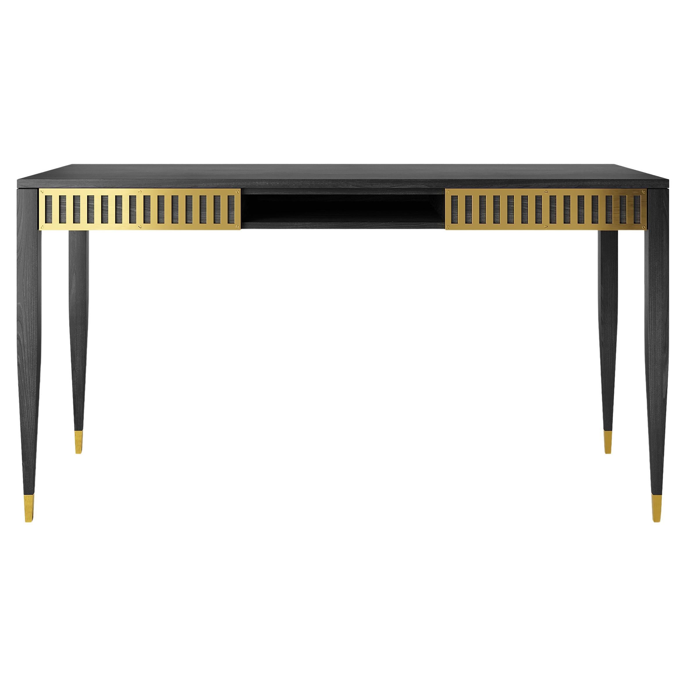 Black desk with two drawers, shelf and brass fronts in mid century modern style