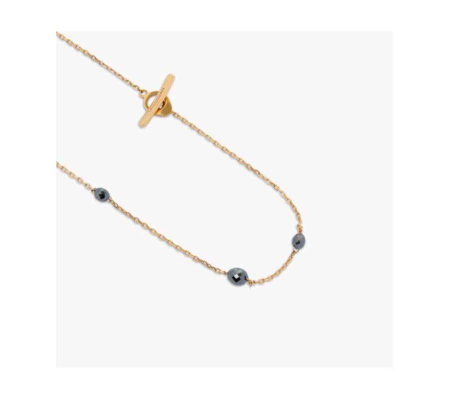 Black Diamond and Baroque Pearl necklace in 18k rose gold

Black diamond stones and grey baroque pearls adorn an 18k rose gold chain, scattered across the necklace in an understated and modern fashion. The irregular-sized diamonds are meticulously