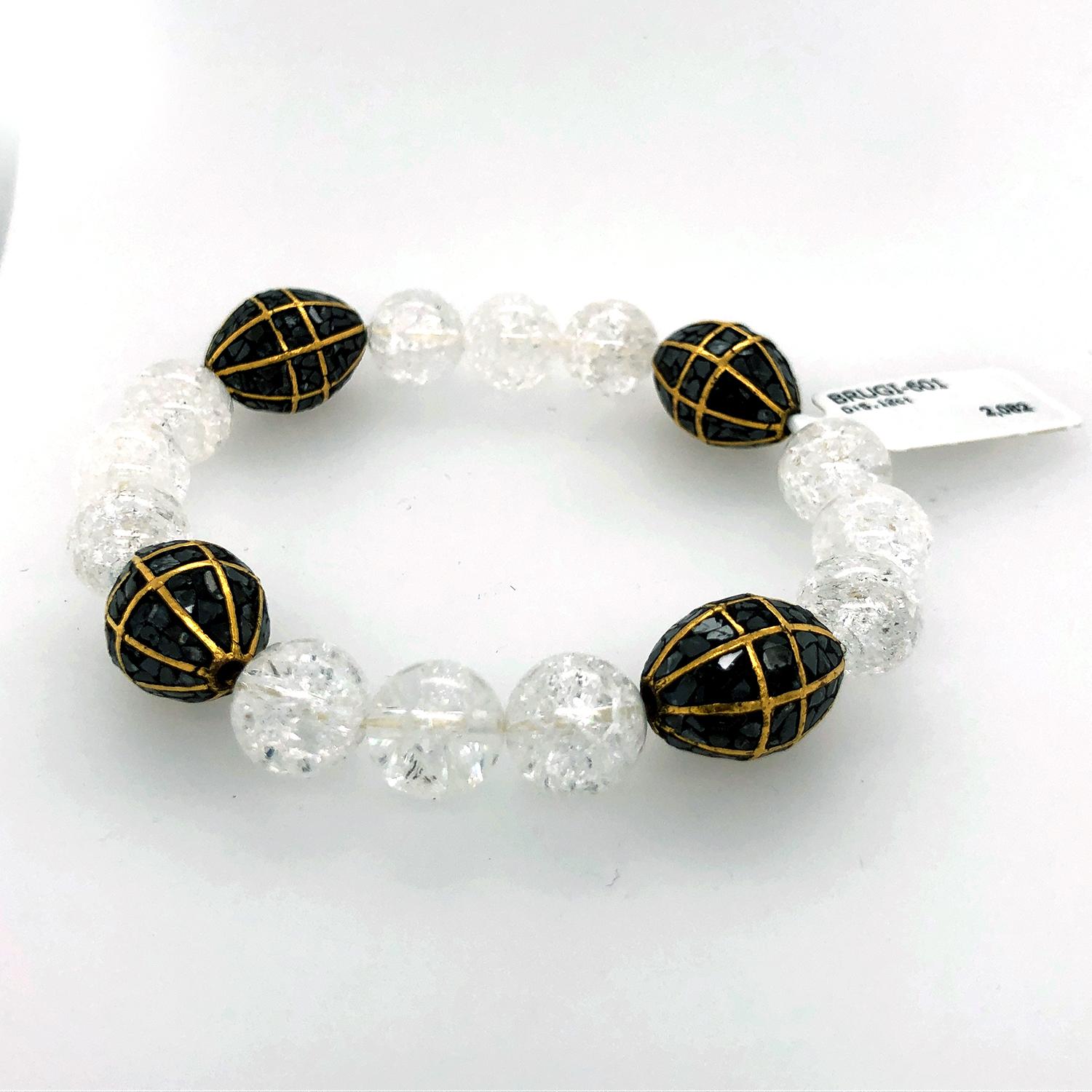 Great to stack this Black Diamond Oval shape bead and Crystal stretchable bracelet is lovely.

Diamond: 5.12cts
Quartz: 125cts
Bead Size:14-15mm
Crystal Bead Size:8-9 mm
 