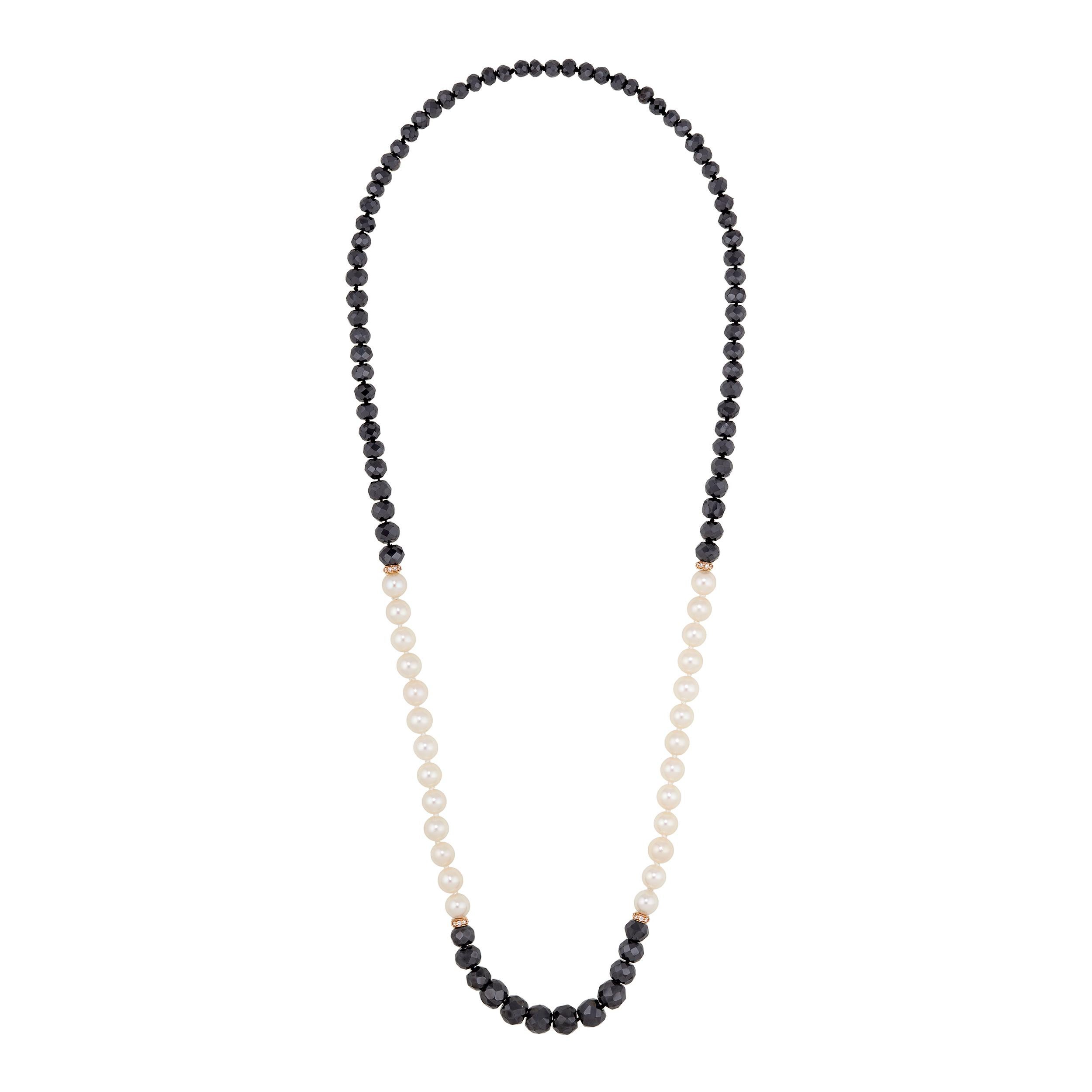 Very high quality AAA Cultured Saltwater Pearls strung alongside faceted Black Diamonds.  The sections are punctuated by 18 Karat Yellow Gold and Diamond spacers.  This necklace is designed as a Mala necklace.  A Buddha bead and tassel can be added