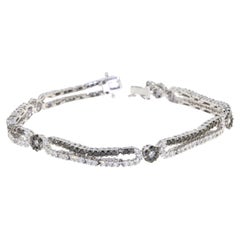 Bracelet en or blanc 18 carats avec diamants noirs et diamants blancs