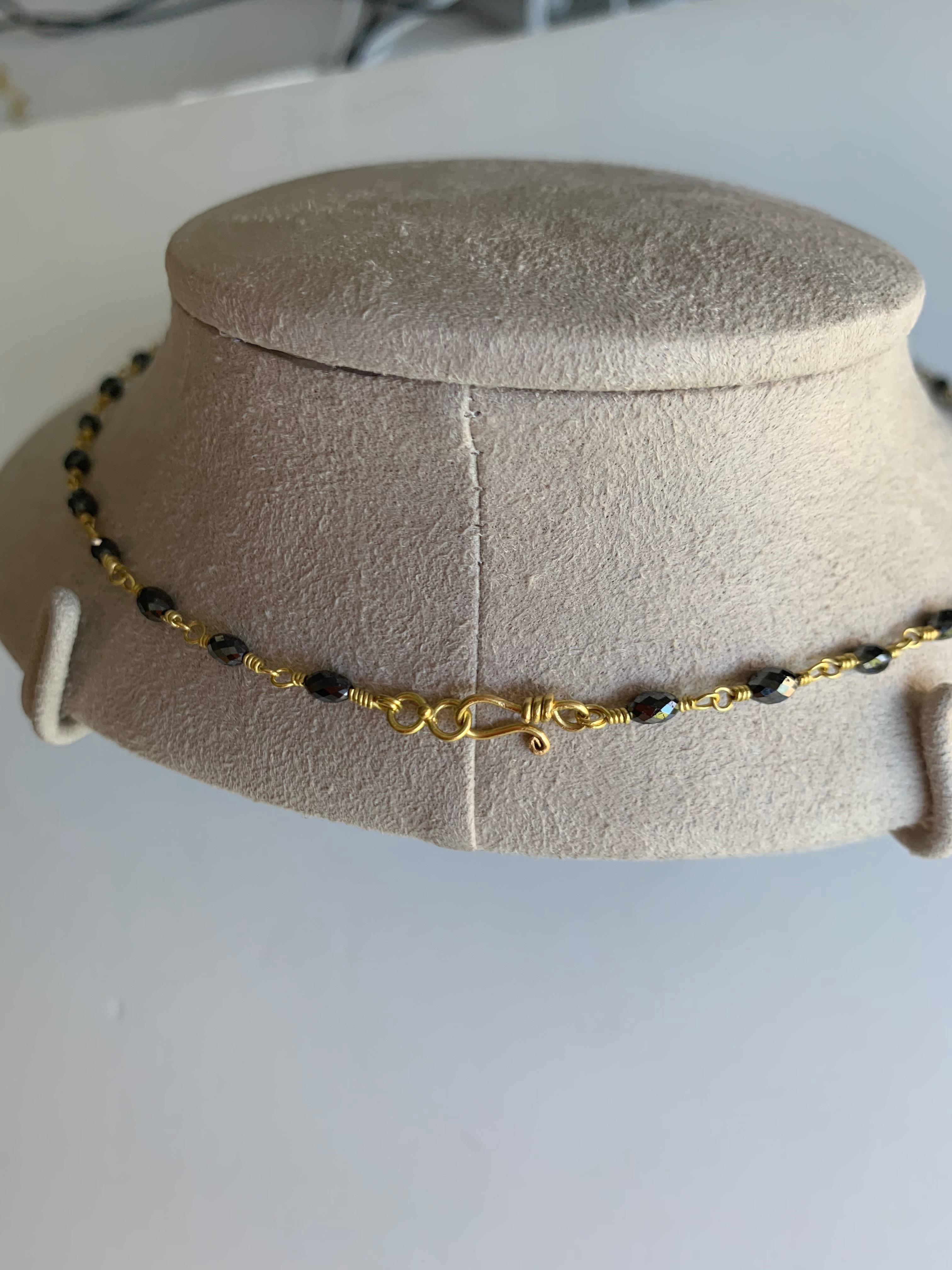 Very bright oval black Diamond bead necklace 18 inches long,  In 20 karat gold. This necklace is both delicate and bold.
Diamonds weigh 16 carats.
Hand crafted by the artist in her New York studio
