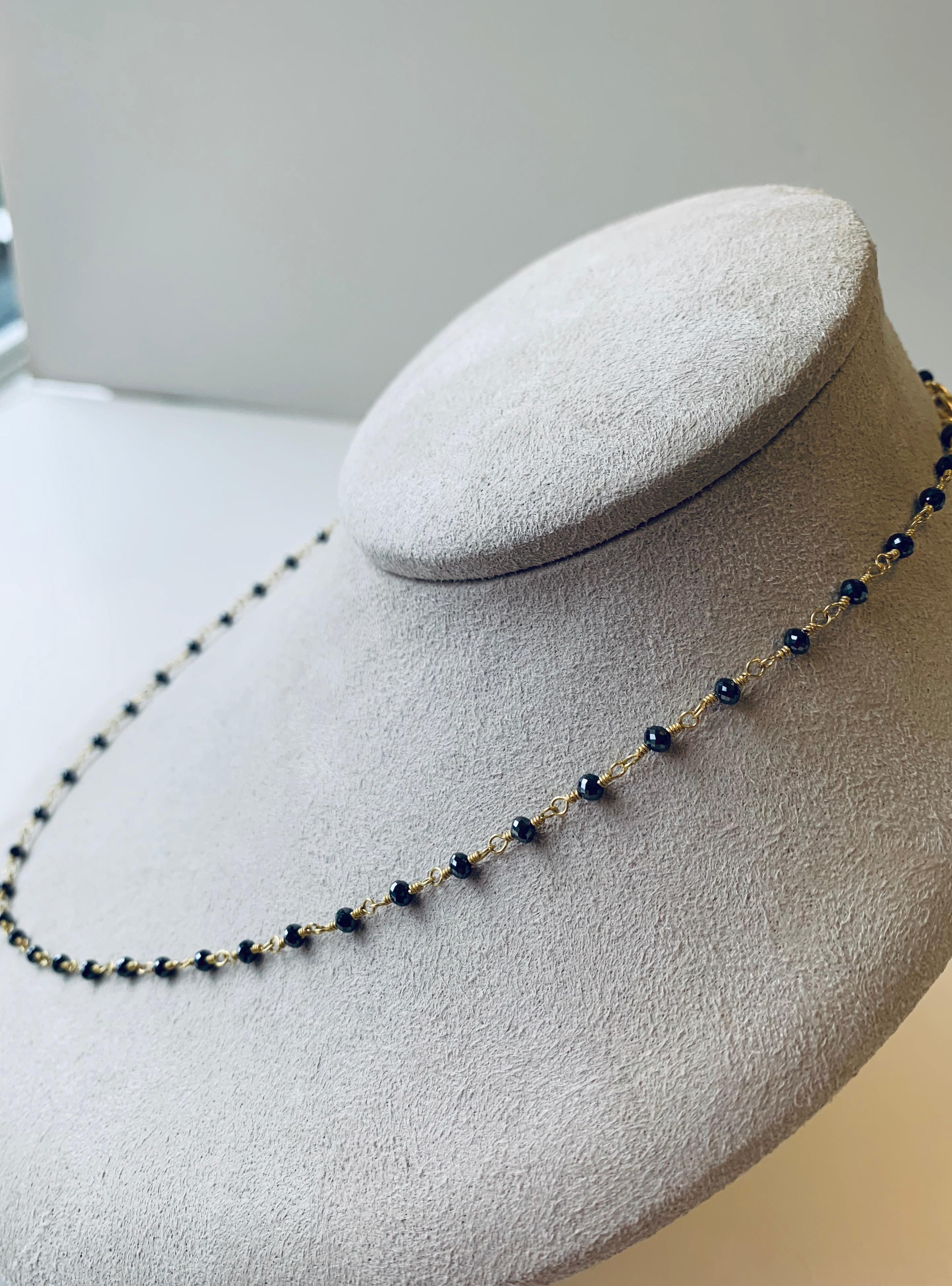 Delicate and bright 18 inch black diamond bead necklace on 20 karat gold, elegant and easy to wear. 
Entirely handcrafted in New York and one of a kind.
12.5 carats of black diamonds the necklace is 18 inches long.