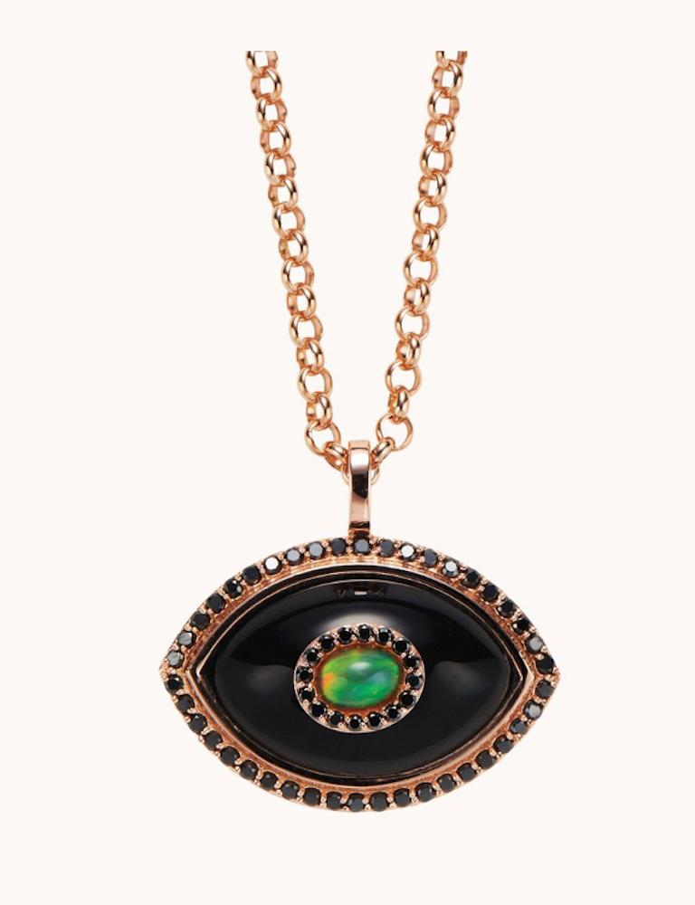 An ancient talisman originating from the near east, The Marlo Laz iconic Eyecon series revisits the evil eye with our own sculptural, ornate perspective and an ode to surrealism. Black onyx for protection, black diamonds for strength, and opals for