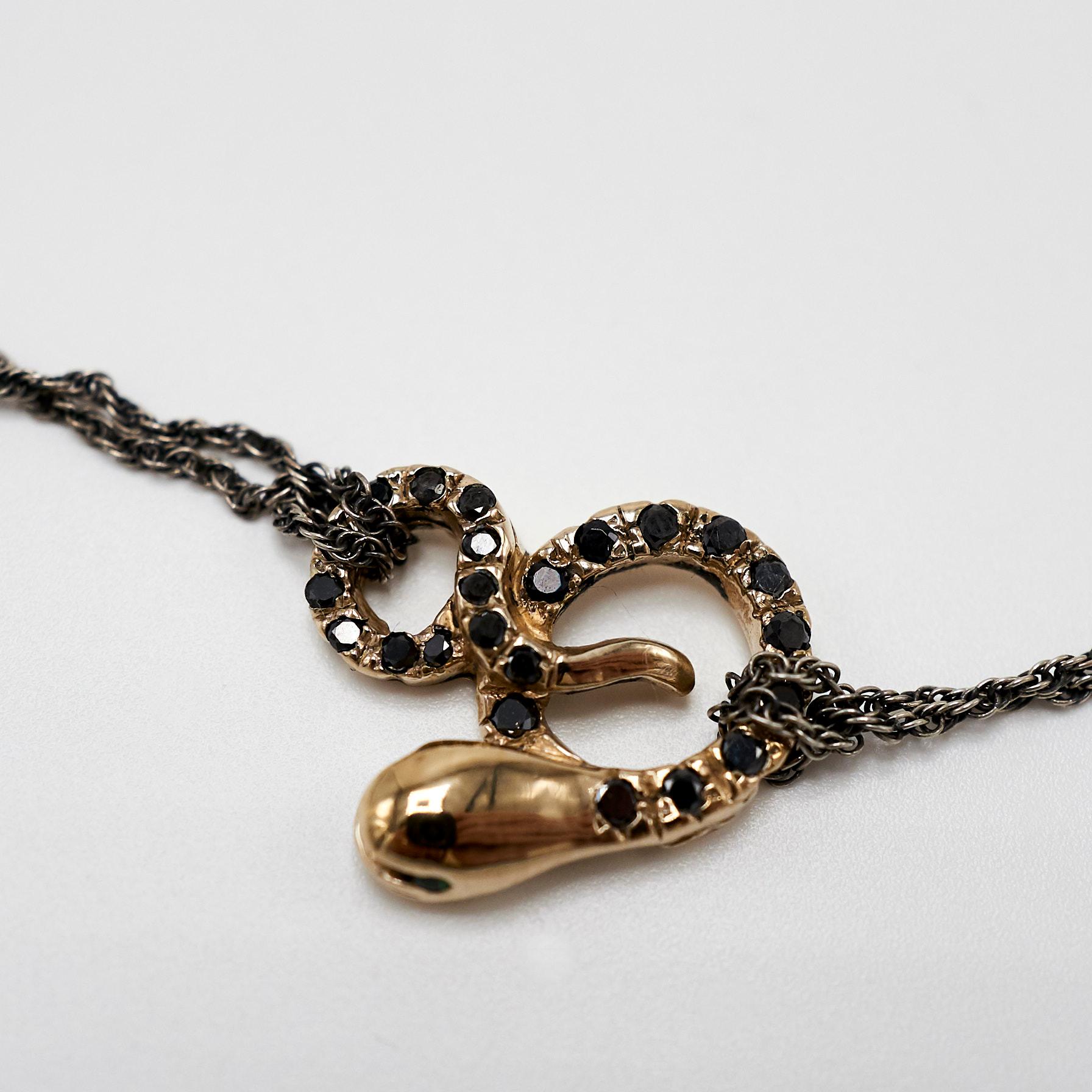 Black Diamond Emerald 14K Yellow Gold Snake Necklace Pendant Sterling Silver Chain J Dauphin

J DAUPHIN Made in 14K Gold with Silver Chain

Inspired by the victorian time

Hand Made in Los Angeles

This piece is made to order and will take 3-4 weeks