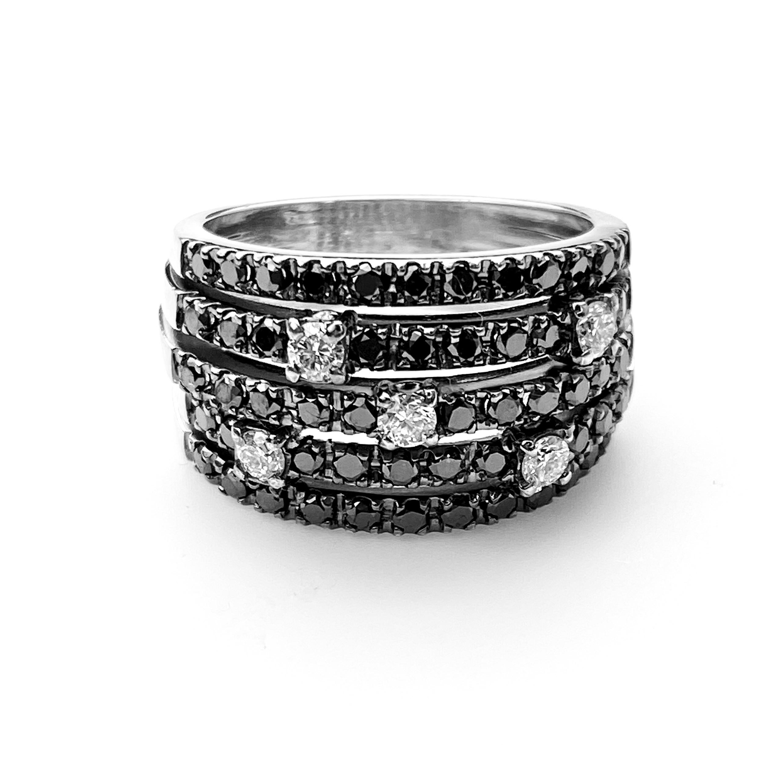 Black diamond five-row ring with white diamond accents. 1.31ct total diamonds. Ring size 6 1/2. Resizing up or down 2 sizes included in price.
