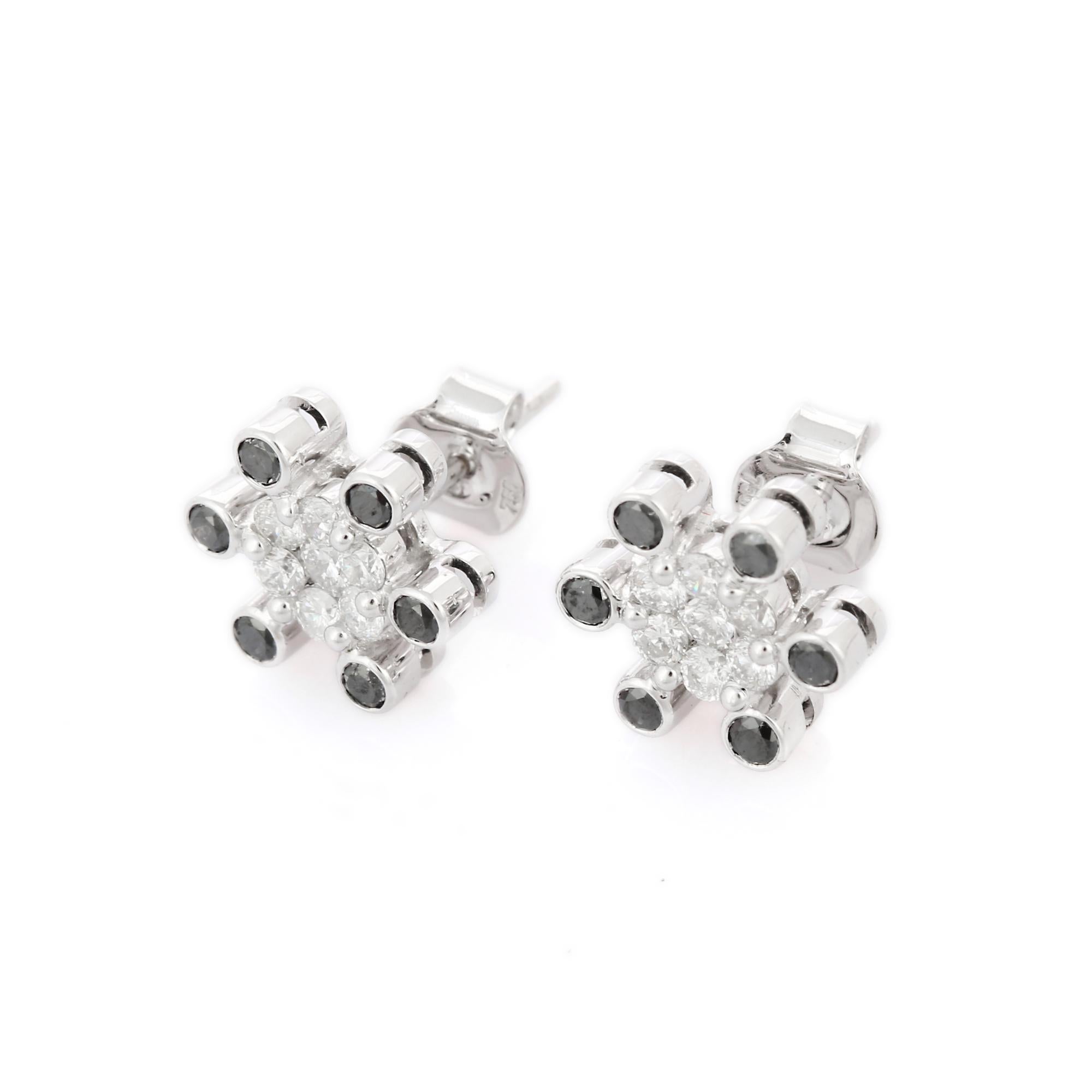 Studs create a subtle beauty while showcasing the colors of the natural precious gemstones and illuminating diamonds making a statement.

Round cut black diamond studs in 18K gold. Embrace your look with these stunning pair of earrings suitable for