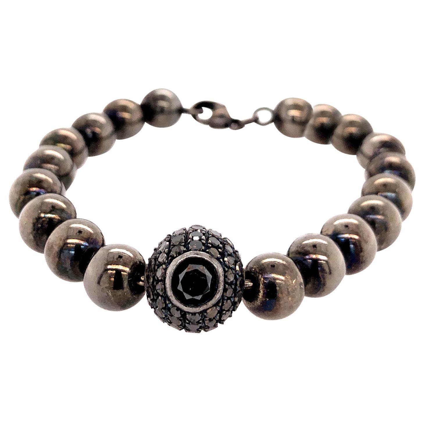 Gianni Versace gold toned bracelet with Medusa and Greca For Sale at