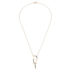 Collier creux éclairé en or rose 14 carats avec diamants noirs