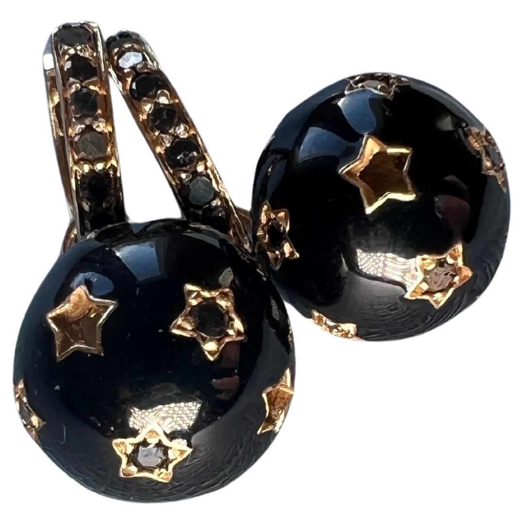 Black Diamond White Diamond Hoop Dangle Earring with a sphere covered in stars set with diamonds

Victorian Style with Black Enamel

Designer: J Dauphin

These hoop earrings incorporate white diamonds, which are associated with clarity, purity, and