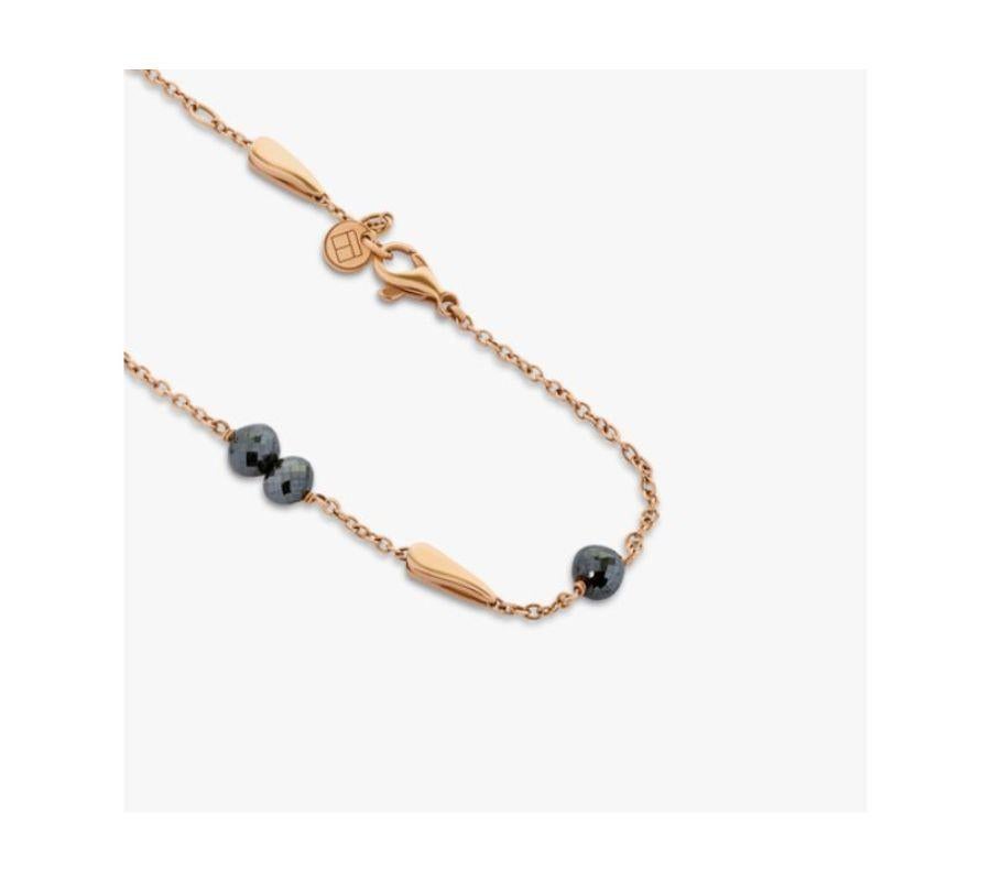 Black Diamond necklace in 18k rose gold

12 black diamond stones adorn an 18k rose gold chain, scattered across the necklace in an understated and modern fashion. Each black diamond stone has been meticulously placed around the necklace, leaving the