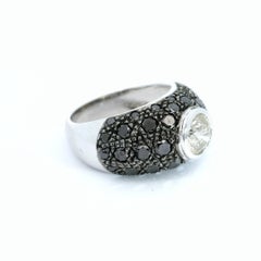 Black Diamond Pavé Ring with 0.65 carat White Diamond Center