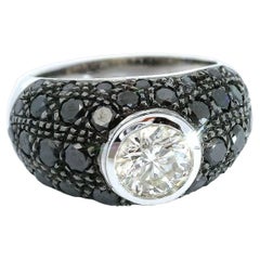 Black Diamond Pavé Ring with 0.65 carat White Diamond Center