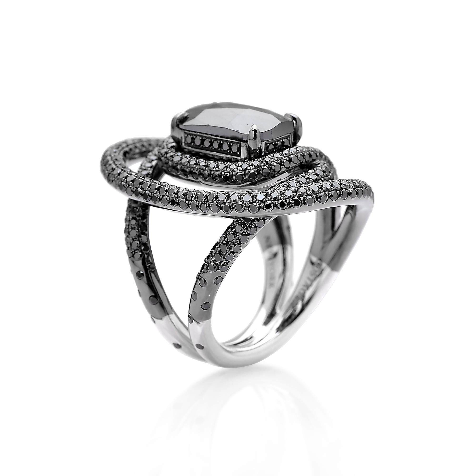 From the 'Intrecci' Collection, one-of-a-kind faceted cushion shape black diamond ring set in 18 karat white gold with black rhodium finish and pave-set black diamond detailing. 

The beauty is in the details - from the combination of hues, the cut