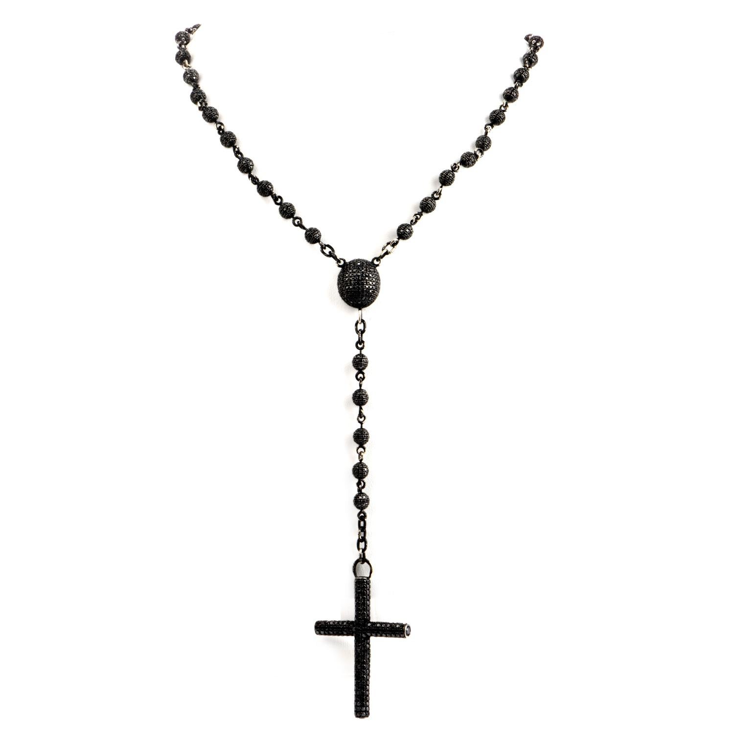 This mystical rosary necklace will take you to another world with its captivating appeal.  

It is crafted in 14k solid gold and embellished with round cut, pave set Black diamonds.

This necklace has an impressive gram weight of approximately 87.20
