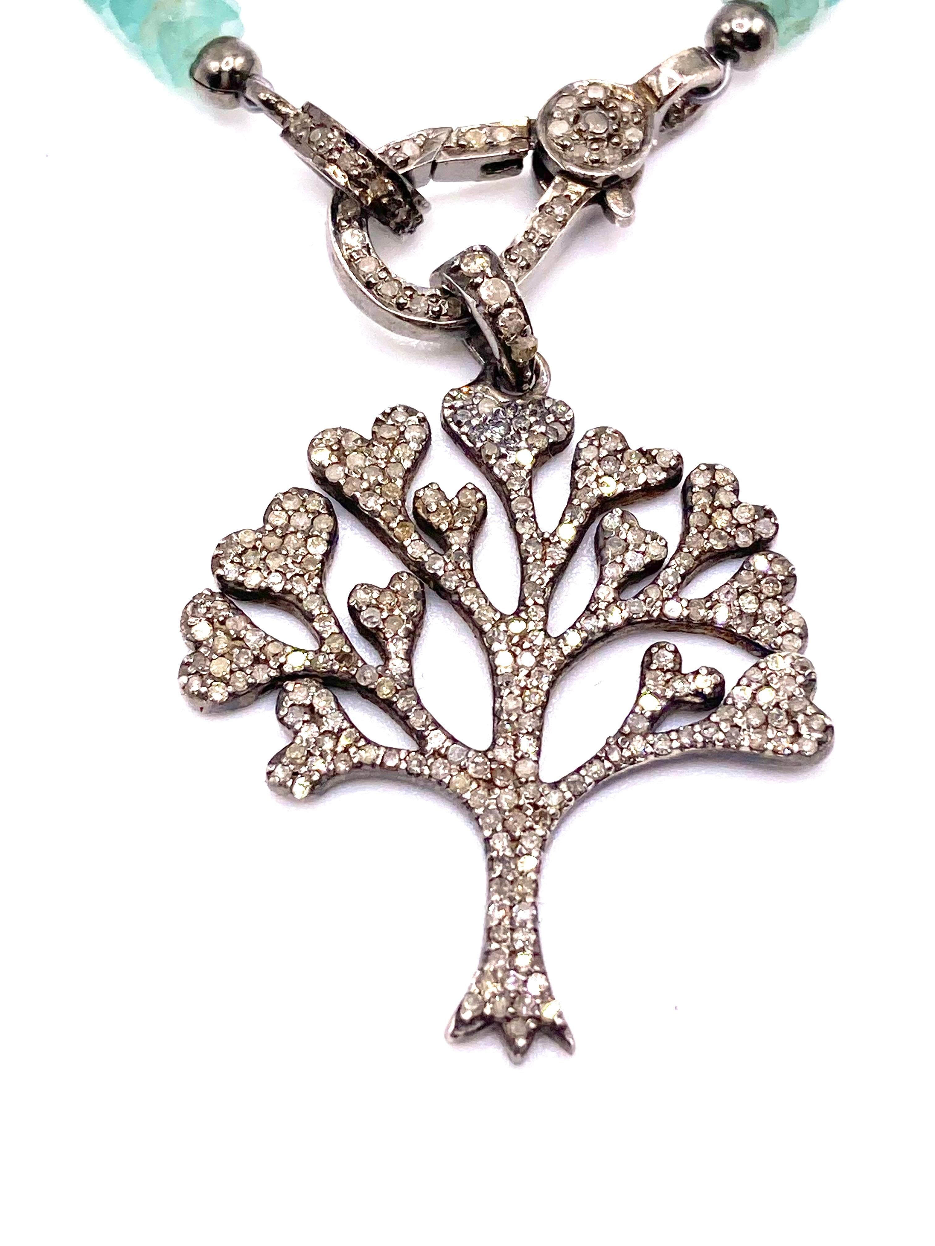 Can be worn with or without the Black Diamond Tree Of Life set on Vintage Silver with a strand of the rare Grandidierite named after Auguste Grandidier who discovered this amazing gem in Madagascar.