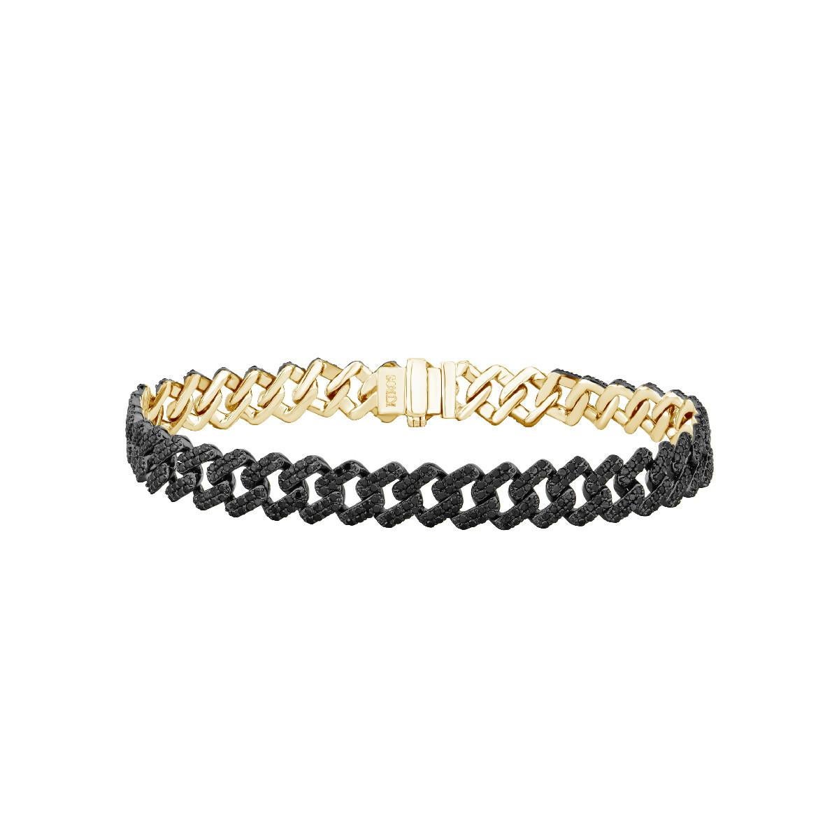 Schwarze Diamanten  & 18K Gelbgold Olympisches Armband
MATERIALIEN
◘ Gewicht des Armbands:   17,24 Gramm
◘ 679 Schwarze Diamanten insgesamt  2,81 ct. 

Irama Pradera ist eine dynamische und aufgeschlossene Designerin aus Spanien, die immer auf der