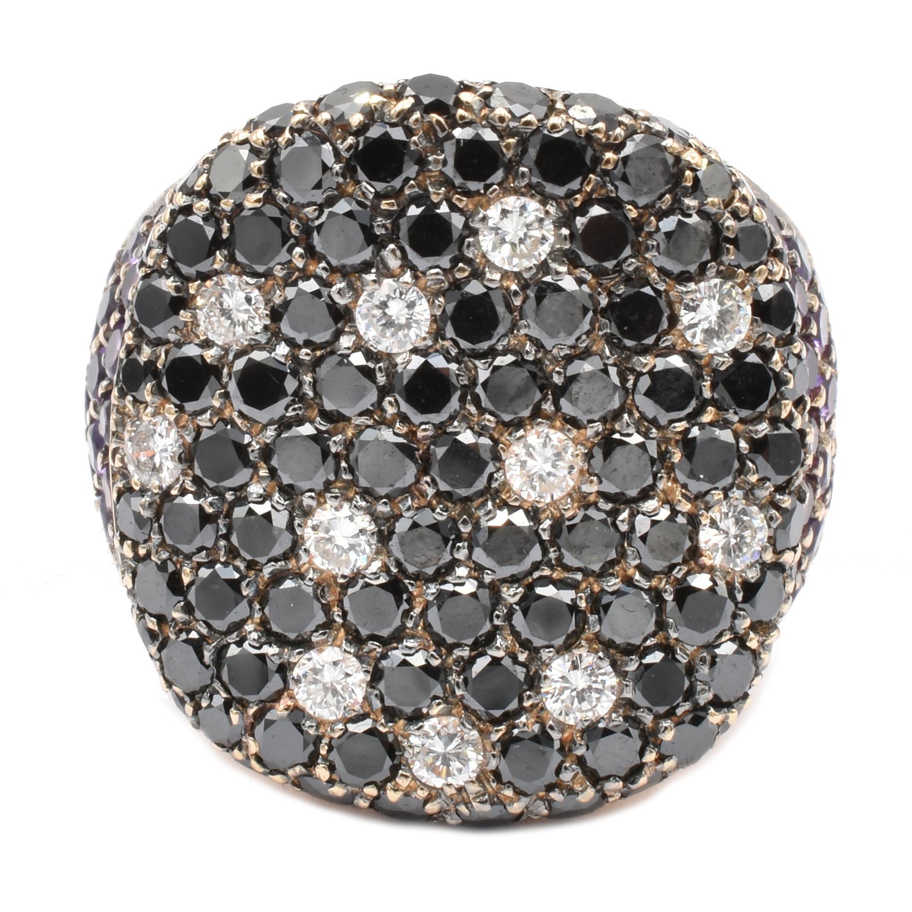 Gilberto Cassola 18Kt Rose Gold Ring with Black Diamonds and Amethyst set on Black Rhodium Plated 18Kt Gold. Some White Diamonds spots on the Black Paveé.
Handmade in our Atelier in Valenza AL.
18Kt White Gold g 12.20
Black Diamonds ct 2.95
G Color