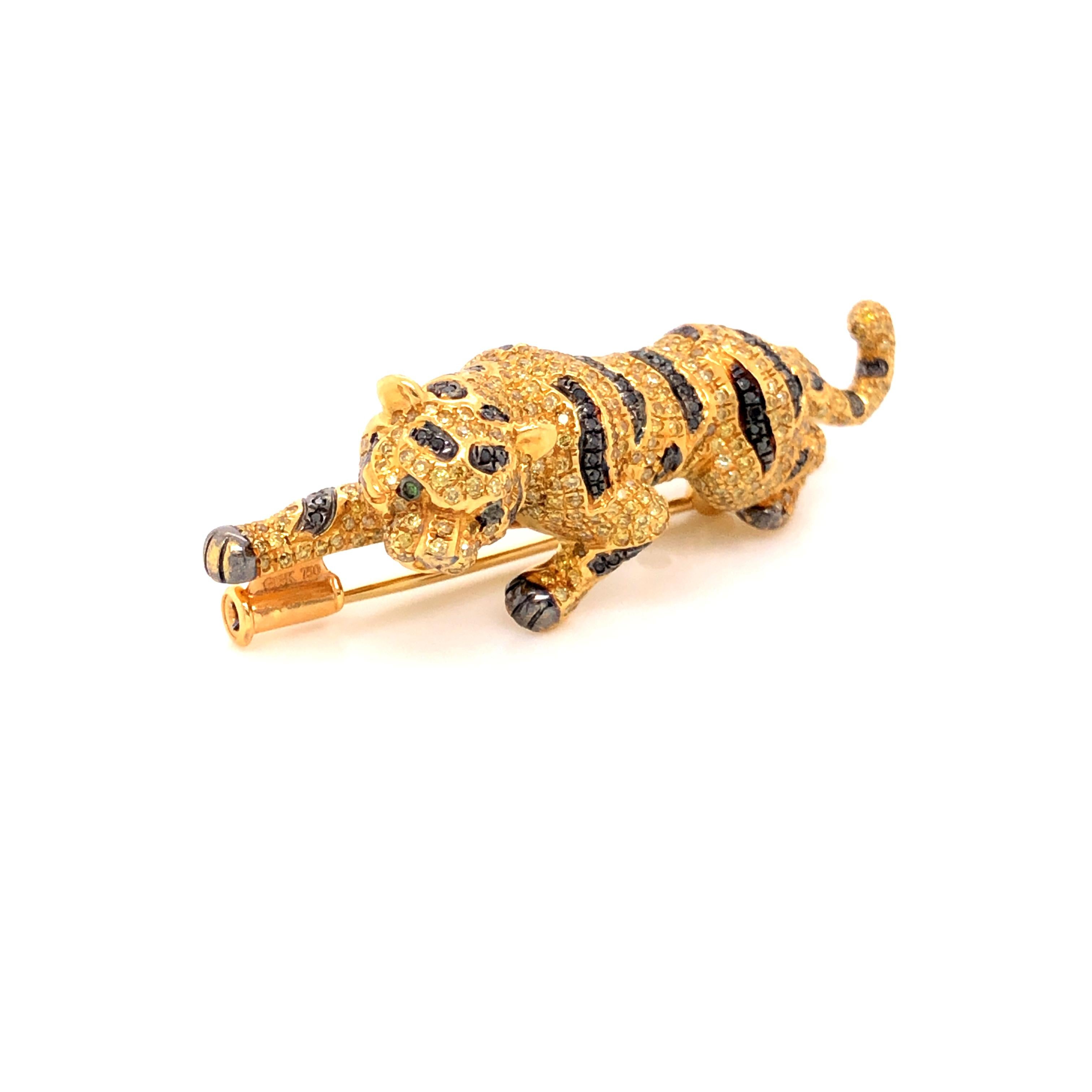 The Black Diamonds and Fancy Coloured Diamonds Leaping Tigress Brooch and Pendant is a breath-taking fusion of power and luxury. Crafted with intricate artistry, this piece portrays a fierce tigress captured mid-leap, exuding strength and grace. The