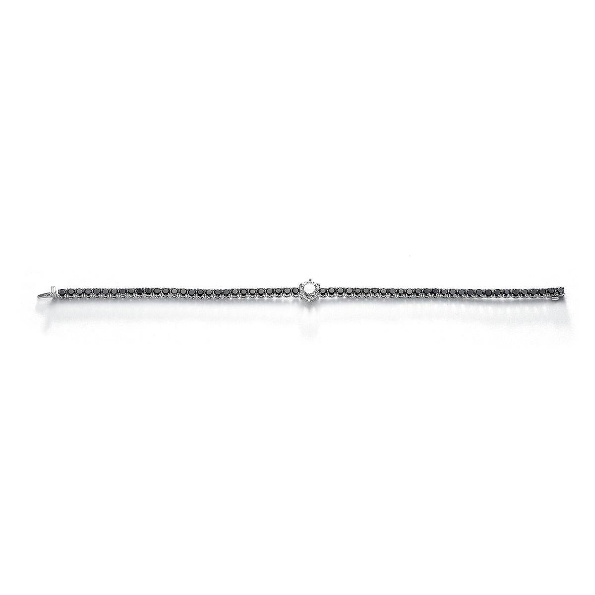Bracelet in 18kt white gold set with one diamonds 1.14 cts M VS1 and 56 black diamonds 6.19 cts     