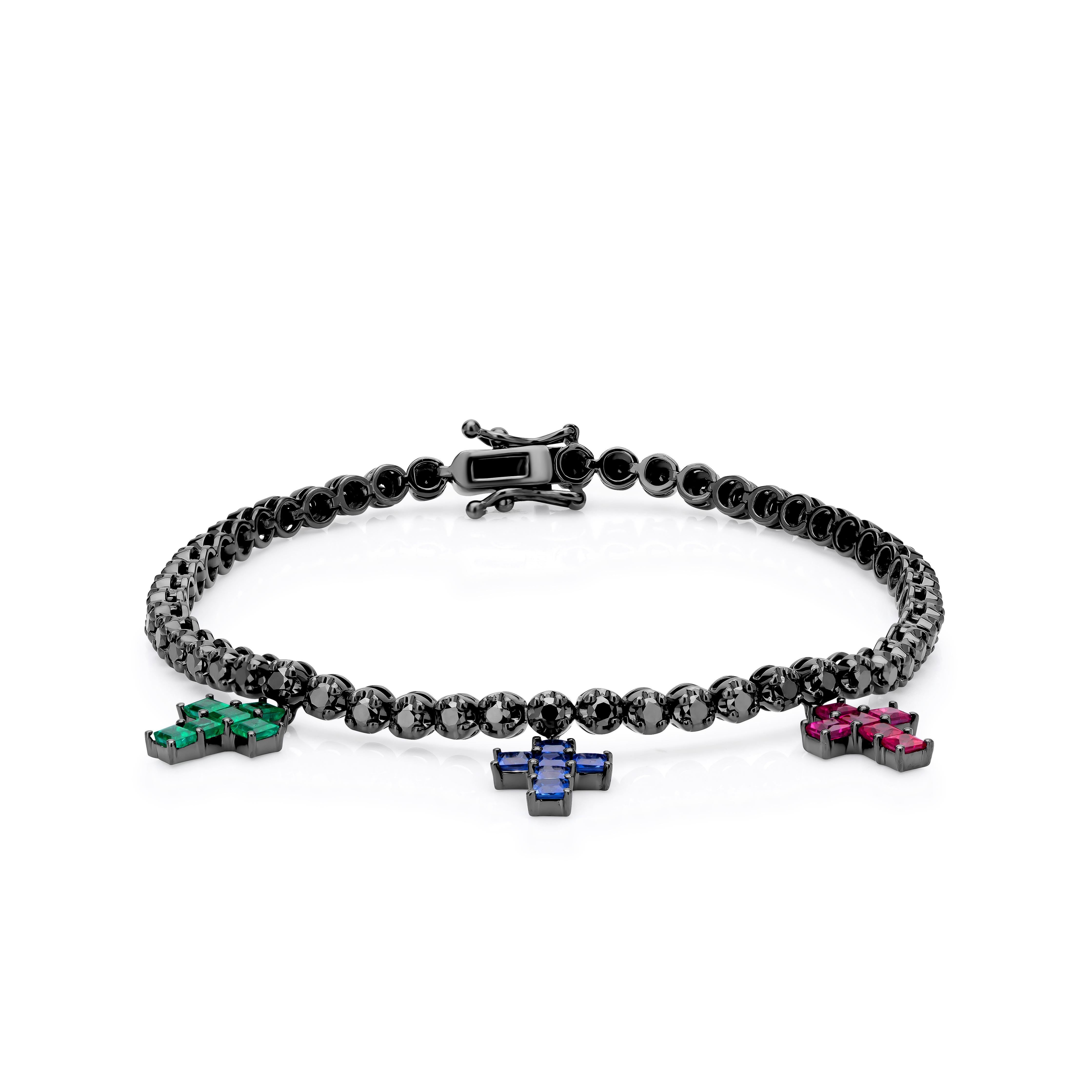 Exhibit radiance on any occasion with this gemstone studded bracelet by Gemistry, having a total diamond weight of 1.98 cwt. The majestic black diamonds are intertwined with square-cut elegant emerald, breathtaking blue sapphire, and regal ruby